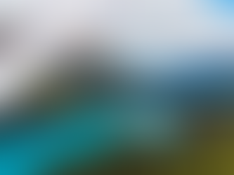 A high-angle landscape of Peyto Lake in Banff National Park, Canada. The bright turquoise water is nestled between steep, pine-covered slopes and jagged, snow-dusted mountain peaks. A purple and white banner in the top left corner reads "Top Family Vacation Destinations for 2026."