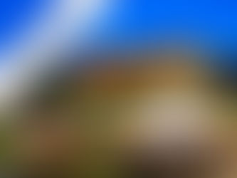 A lively Christmas market in Germany is depicted at dusk, with people milling about under glowing archways decorated with festive lights. In the background, the illuminated Heidelberg Castle stands majestically atop a hill. The sky is a deep blue, with the moon visible in the upper left. A purple and white banner diagonally crosses the top left corner, with text that reads "Are you Ready for Christmas Markets? Germany".