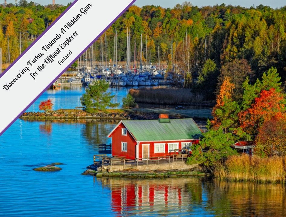 A quaint red cottage with a green roof sits along the calm waterfront in Turku, Finland, surrounded by vibrant autumn foliage and reflecting in the still water. Sailboats are docked in the marina in the background beneath a dense forest of colorful trees. The caption “Discovering Turku, Finland: A Hidden Gem for the Offbeat Explorer” appears diagonally across the top left.