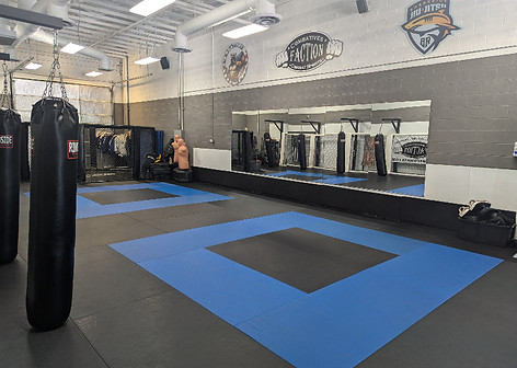 mma, krav maga and bjj signs inside mma and self defense gym Faction Combat in Mesa near apache junction