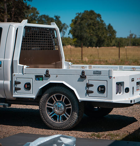 Custom paint match pitter metal products skirted flatbed