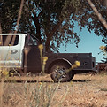 Hybrid flatbed with quarter toolboxes for work truck use
