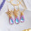 Thumbnail: Swarovski purple peacock teardrop elegant necklace star dangle earrings