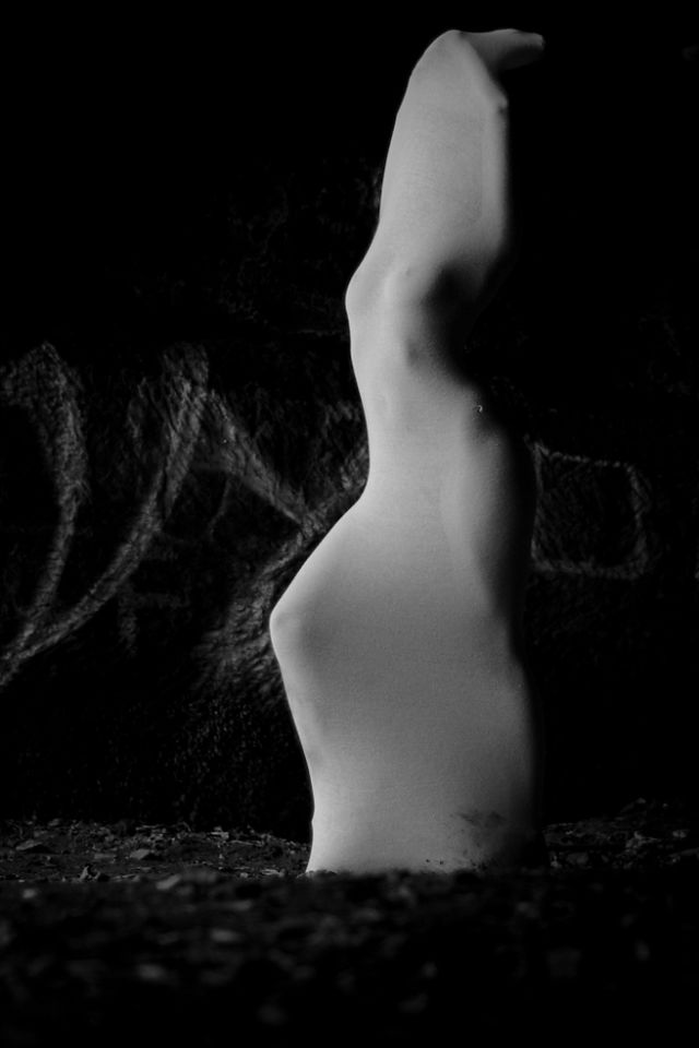 Monochrome of Misuzu in a cocoon on location at Beech Caves