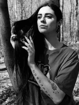 Monochrome close up portrait of Misuzu in casual clothing in the woodland