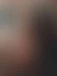 Misuzu in red lingerie, stood infront of a festive backdrop with snow and wreaths