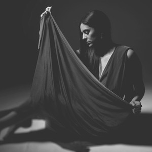 Monochrome of Misuzu sat on the infinity curve taken using the beauty dish