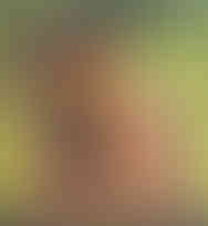 Misuzu topless, leaning on a fence with a black hat and gold jewellery