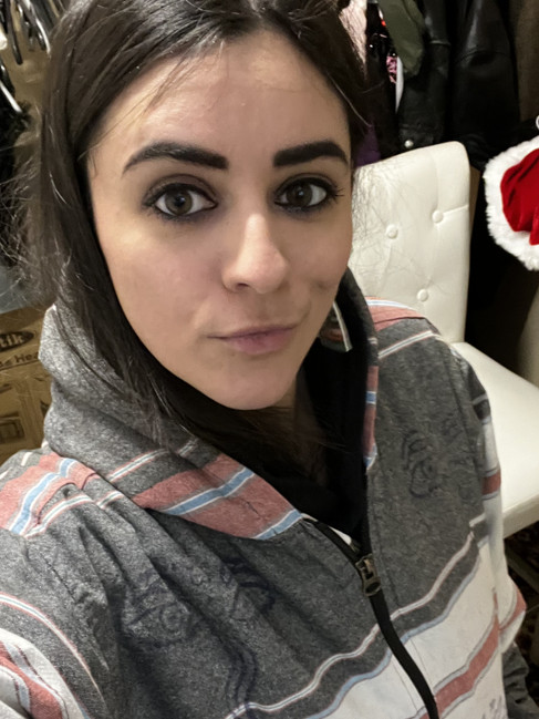 Selfie of Misuzu warming up between sets in a thick zip up hoodie