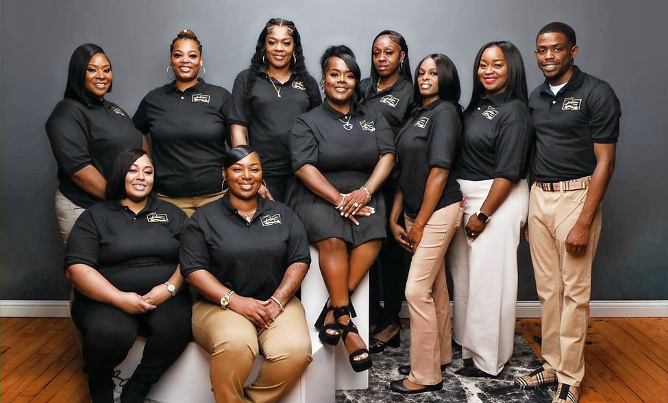 Precision Tax Professionals Team in khaki pants and black with gold precision tax pro t shirt