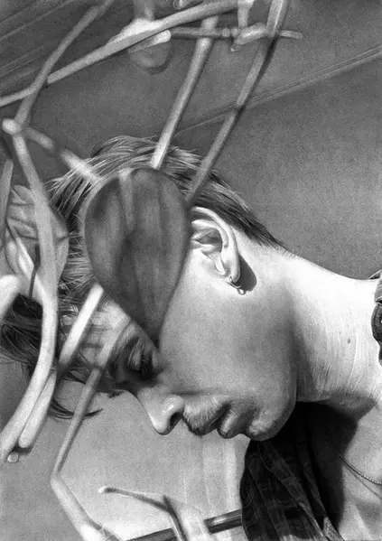 Detailed and realistic charcoal portrait by artist Dylan Andrews.