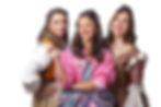 Three women in colorful, embroidered costumes smile confidently. The central woman wears pink. White background. Festive mood.