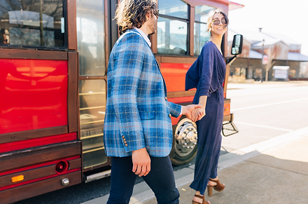 A couple disembarks from the trolley at the downtown stop in front of Braselton Brewing Company