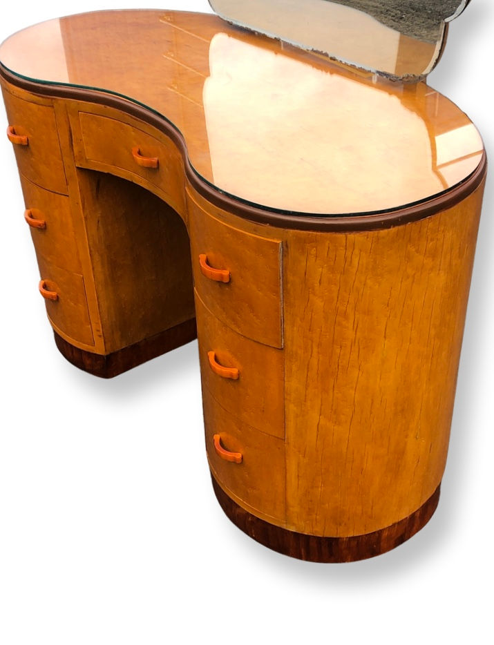 Thumbnail: An English Art Deco kidney shaped Birds Eye Maple, glass topped dressing table