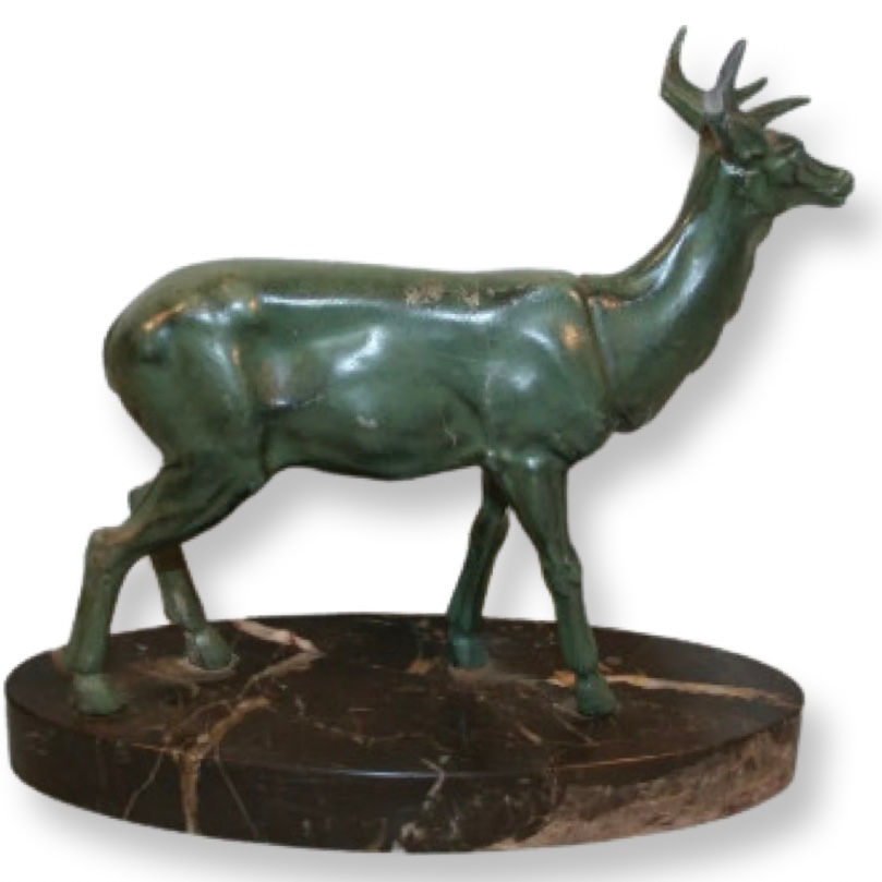 An English Art Deco Spelter Figure of a deer on a marble base