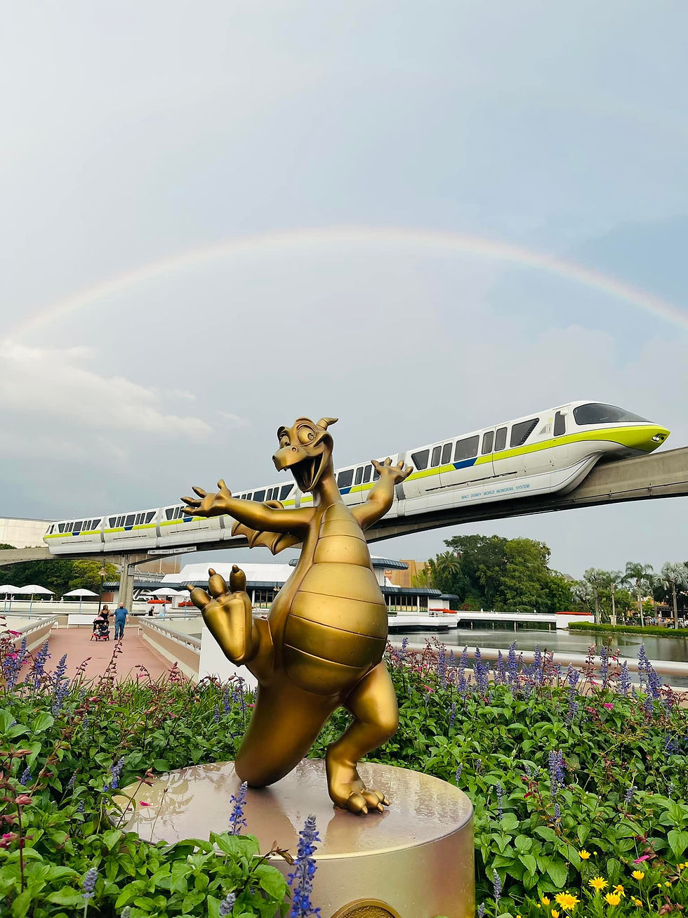 EPCOT under a rainbow with the Disney monorail.