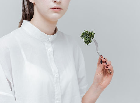 cropped-image-of-stylish-girl-eating-PTF