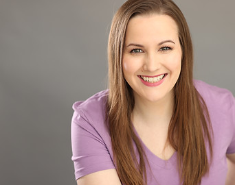HEADSHOT PURPLE SHIRT SMILE.jpg