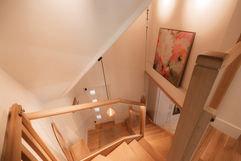 Oak and glass staircase within the annexe