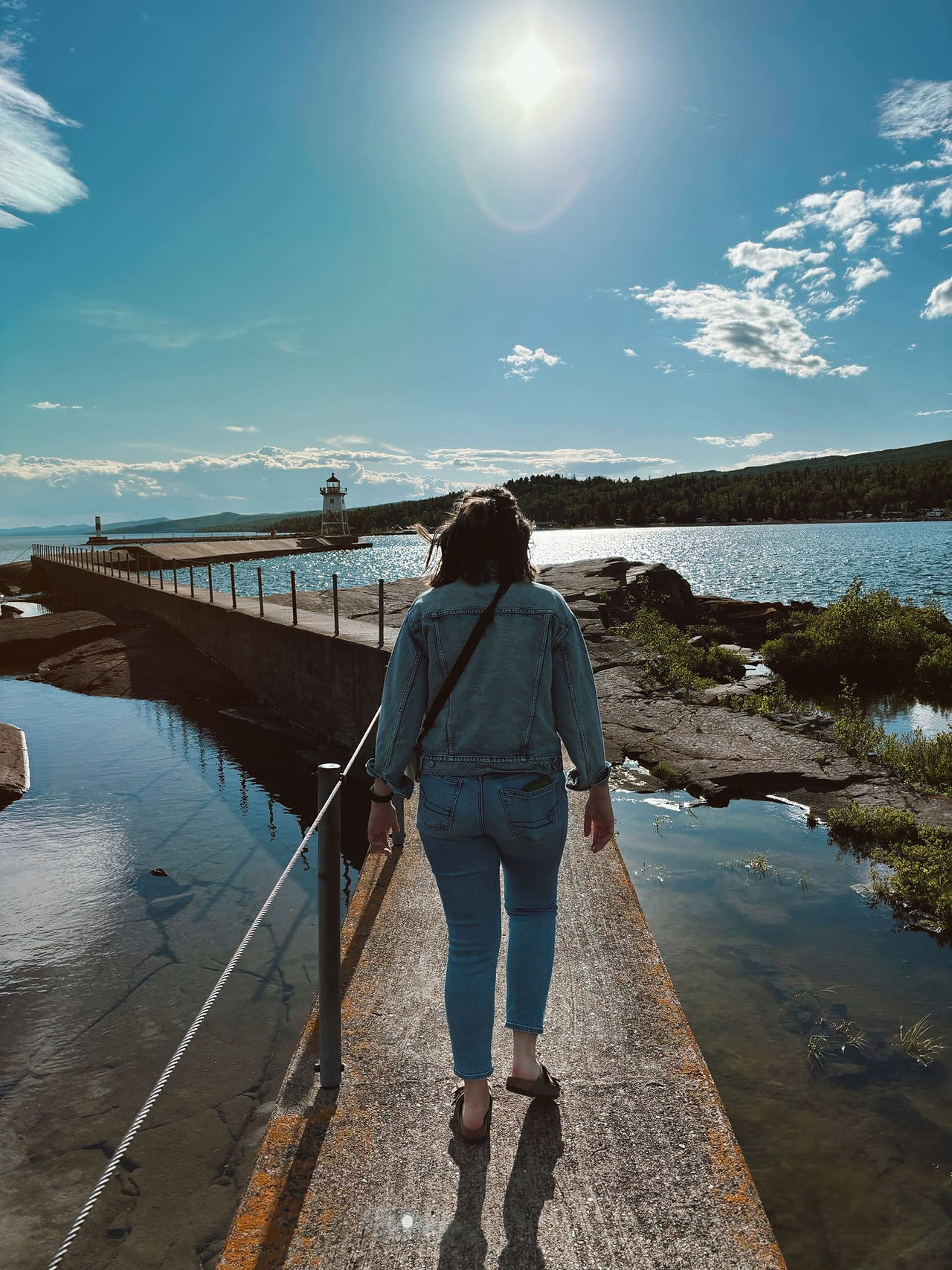 Natalie on her way to the lighthouse in Grand Marais