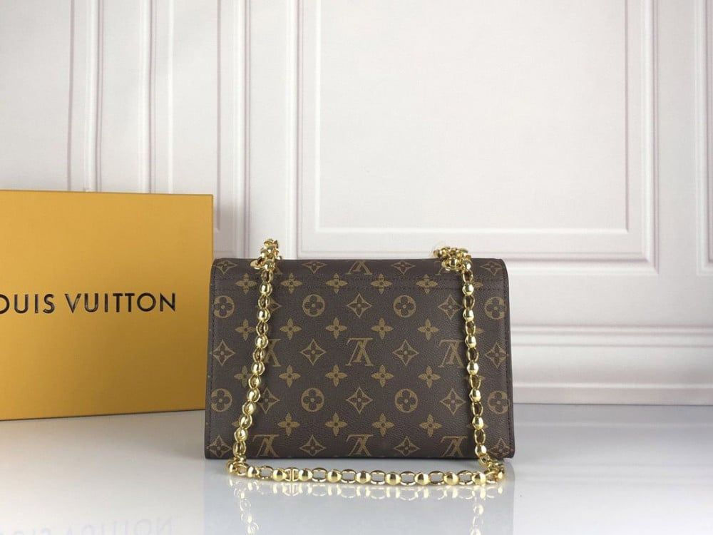 Lou*s Vu*tton monogram canvas victoire bag
