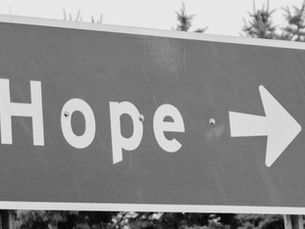 Road sign pointing towards Hope