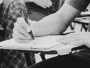 Student at a desk completing a survey