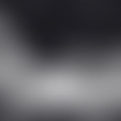 Two people sitting at a table having a discussion