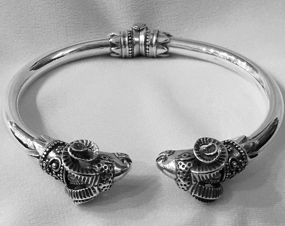 Thumbnail: twin rams torc bracelet