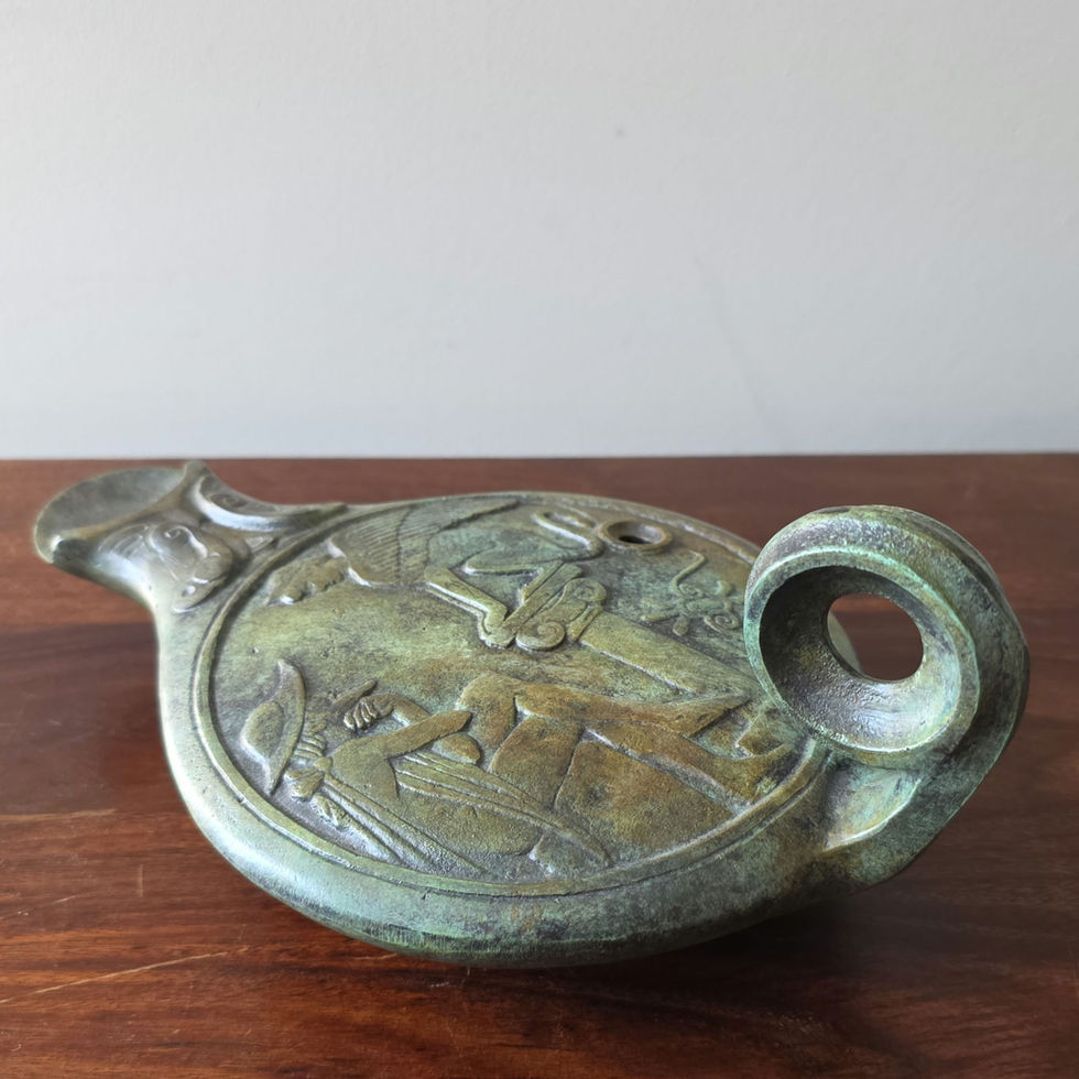 bronze oil lamp with Oedipus and the sphinx