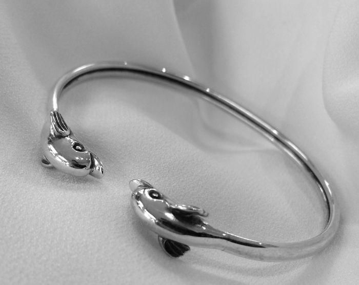 Thumbnail: dolphin pair bracelet