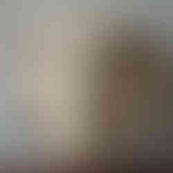 small wall-mounted dramatic mask of the Gorgon Medusa