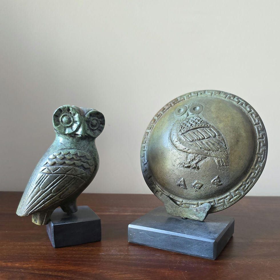 Thumbnail: small bronze shield with the owl of Athens