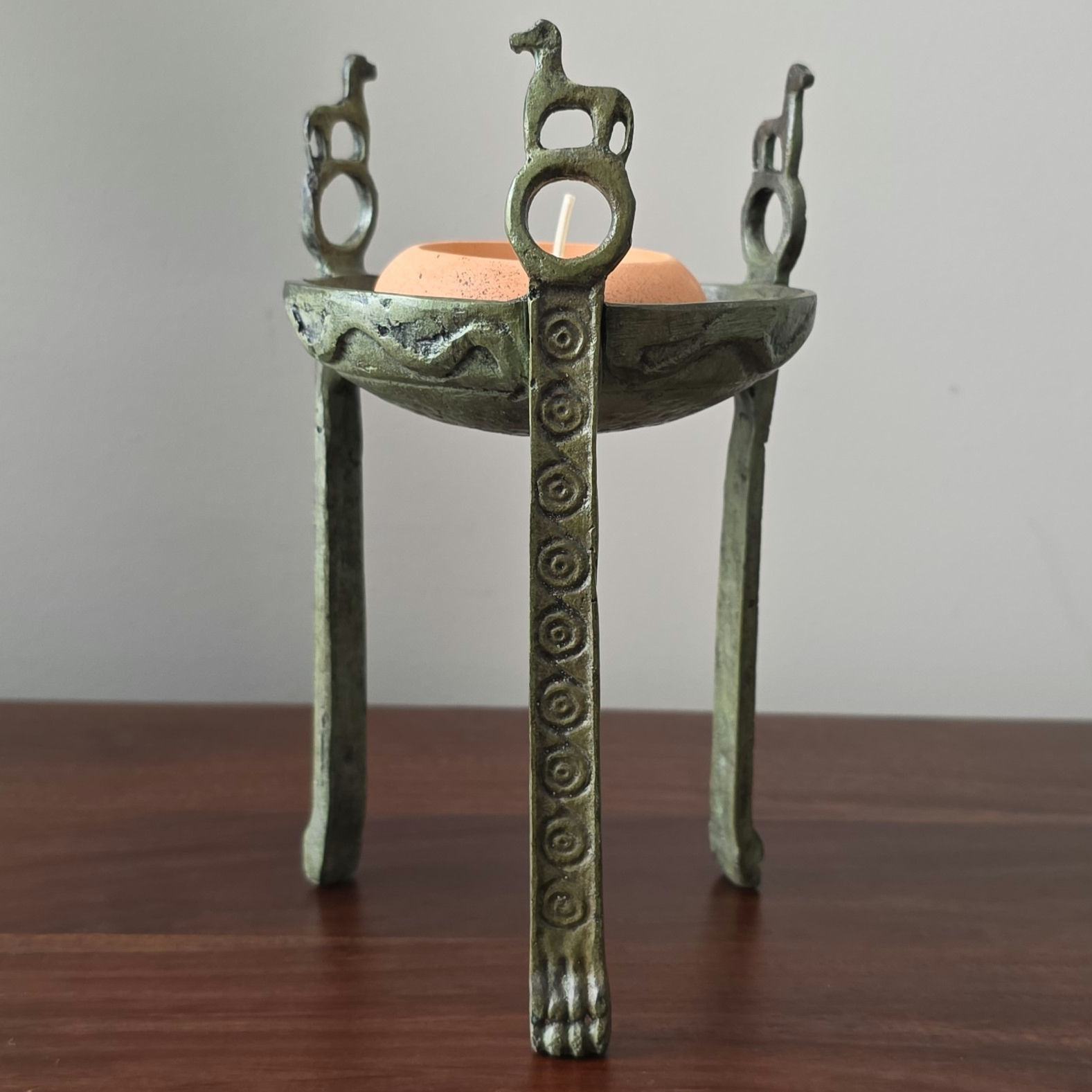 bronze tripod with horses