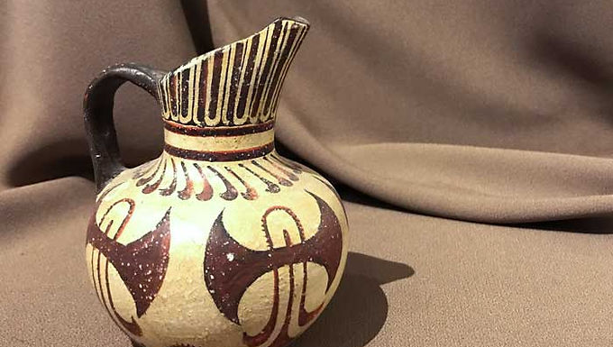 small Minoan prochous with double-axe labrys