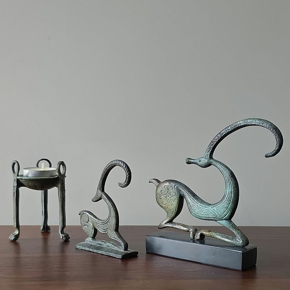 Thumbnail: small elegant bronze ibex at rest