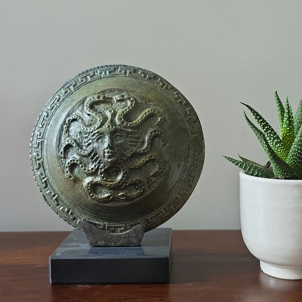 small bronze shield with the Gorgon Medusa