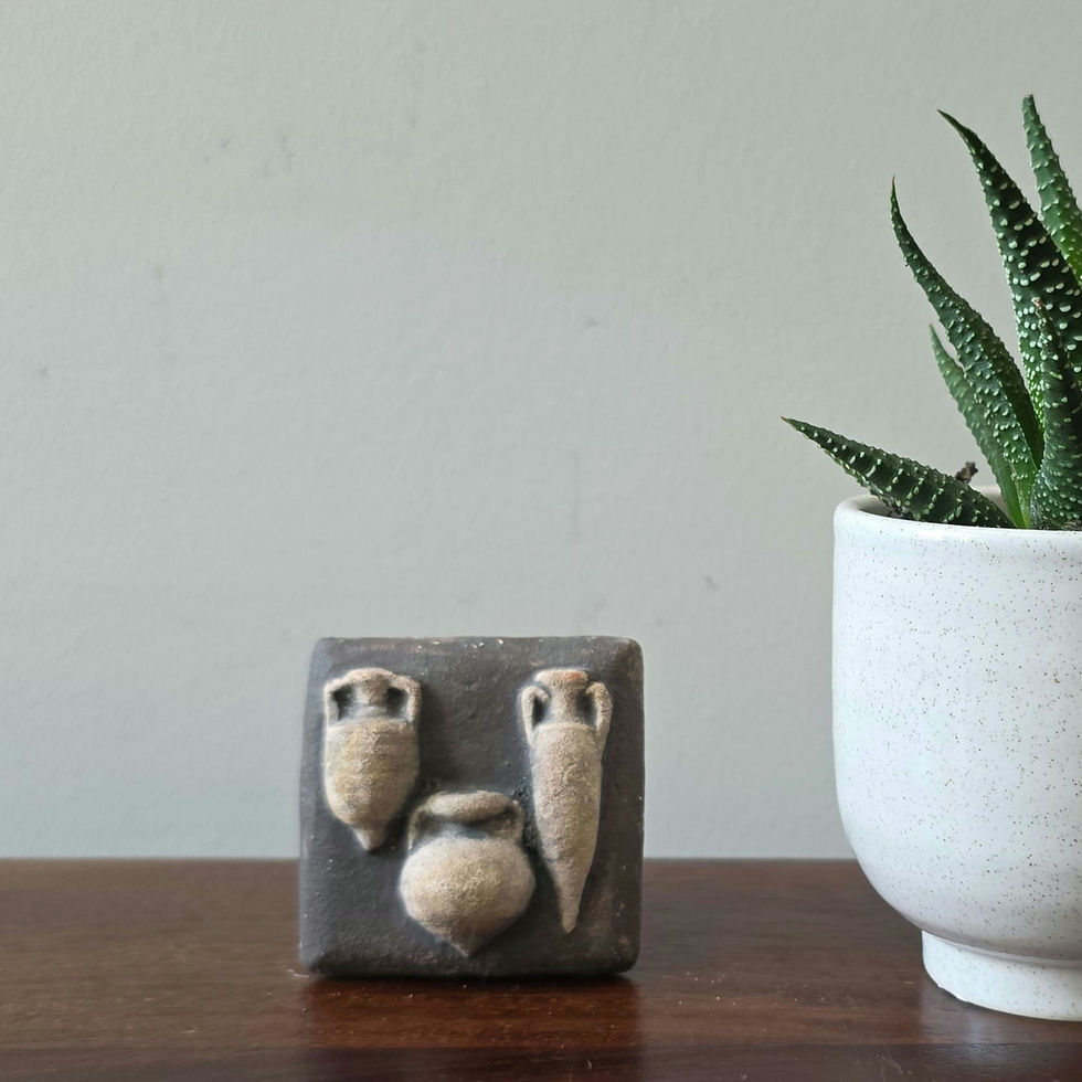 Thumbnail: miniature terracotta trio of pointed amphorae