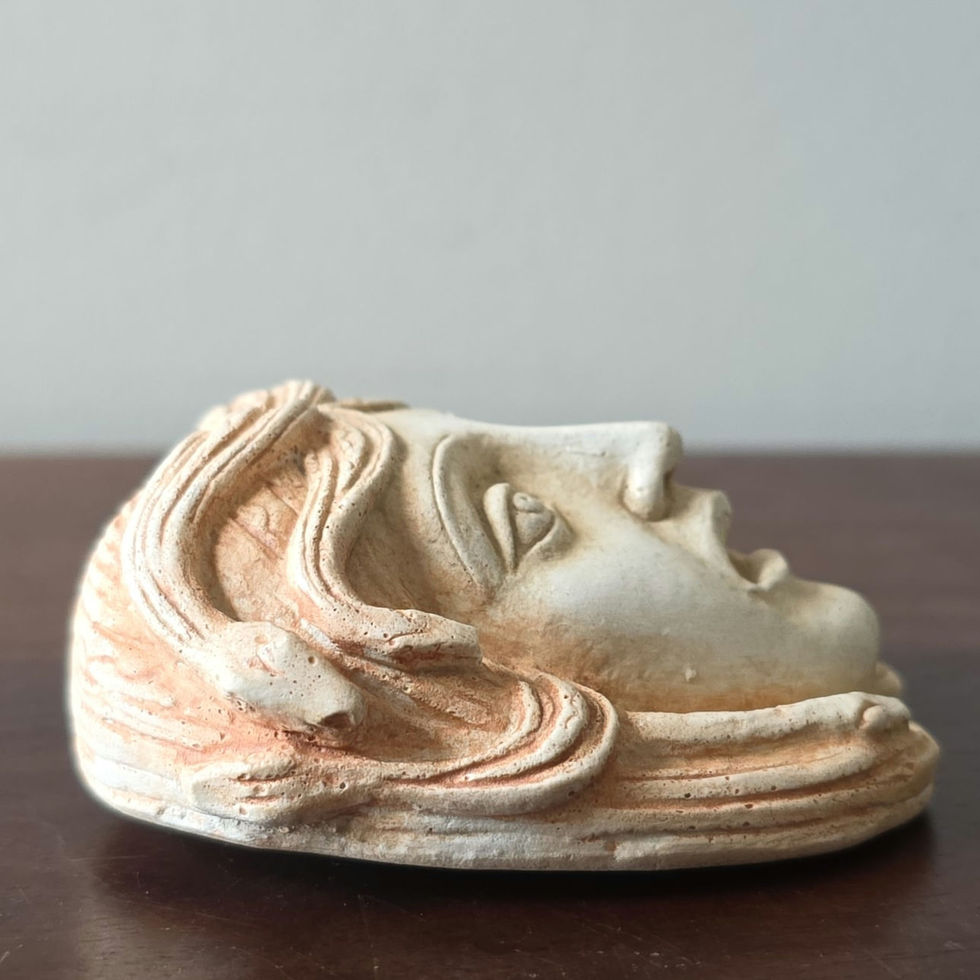 mini dramatic mask of the Gorgon Medusa