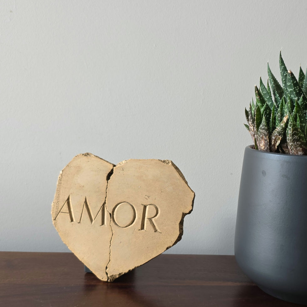 Latin inscription: 'Love'