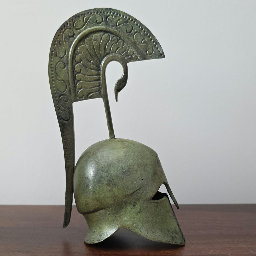 small bronze helmet with elongated swan crest