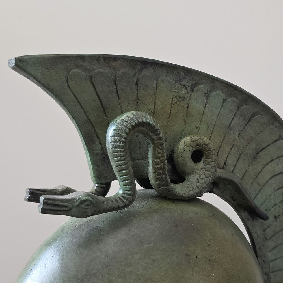 Thumbnail: large bronze helmet with twin serpents crest