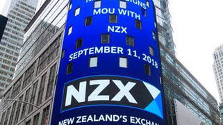 Gold has pushed to a peak as NZ shares plummet