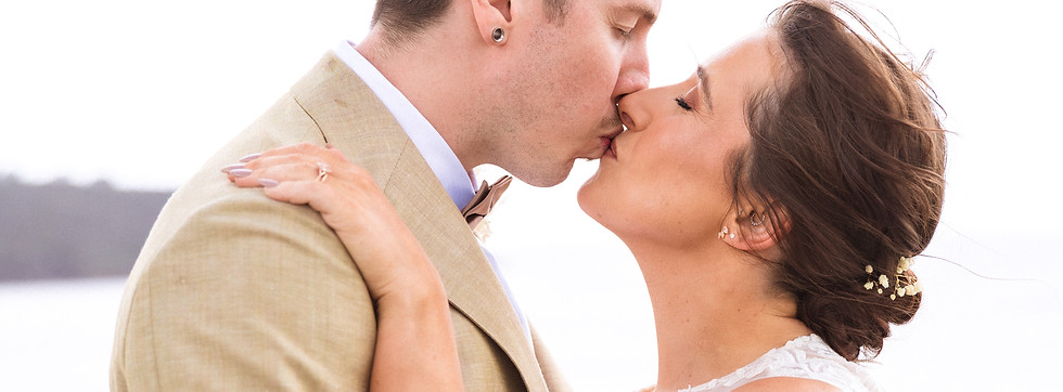 Couple kissing in scenic area