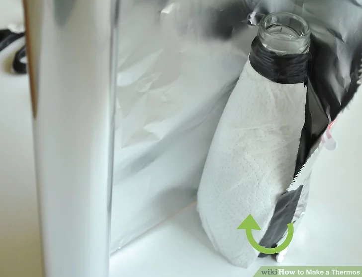 Wrap paper towel around bottle.