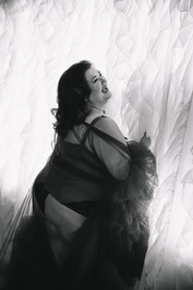 a bare elegance guest enjoying her luxury boudoir session serving midlands and upstate sc