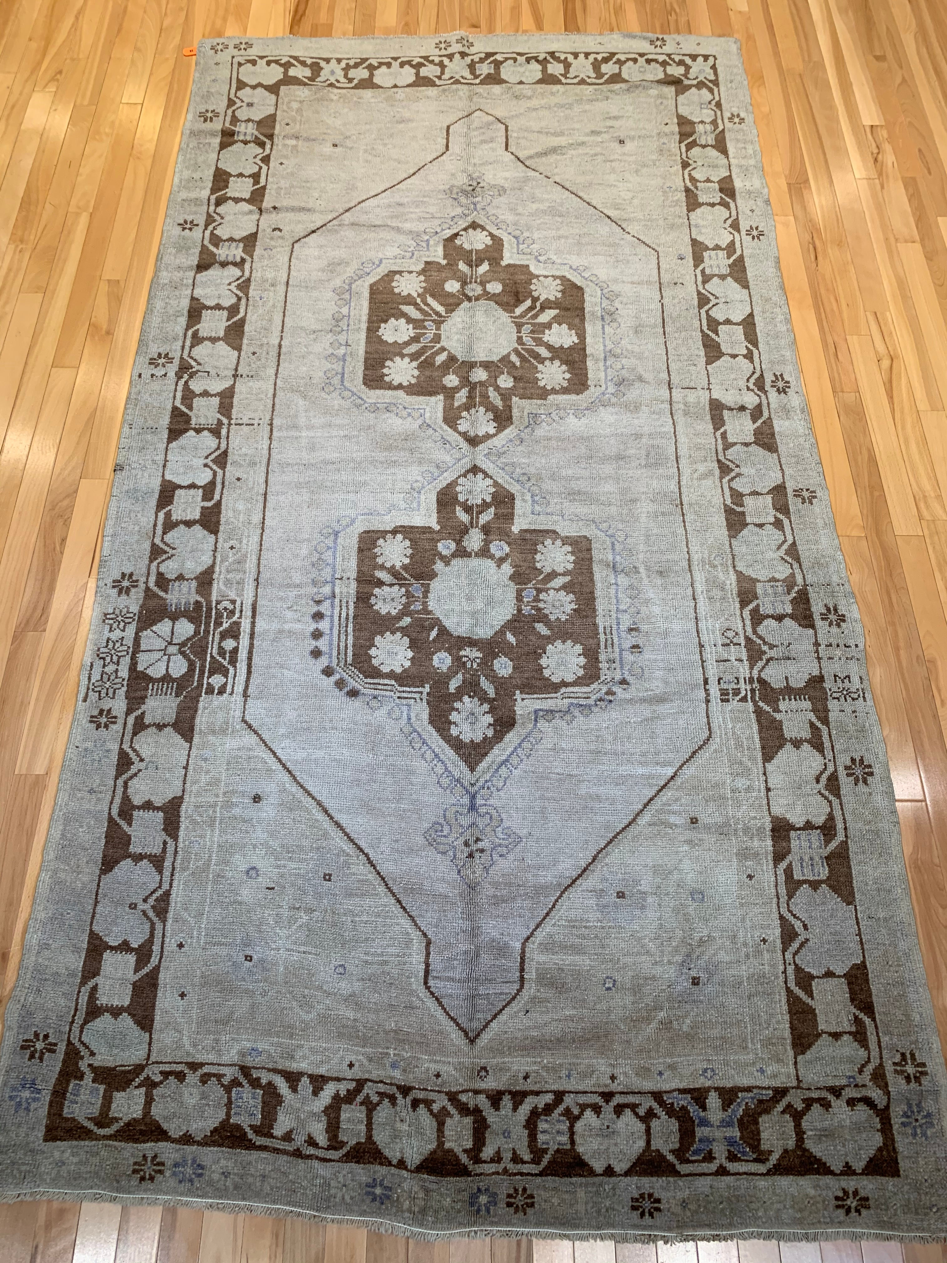 Oushak runner at Persian Gallery of Nashville. Handmade in Turkey, wool-cotton mix for durability. The rich brown tones
