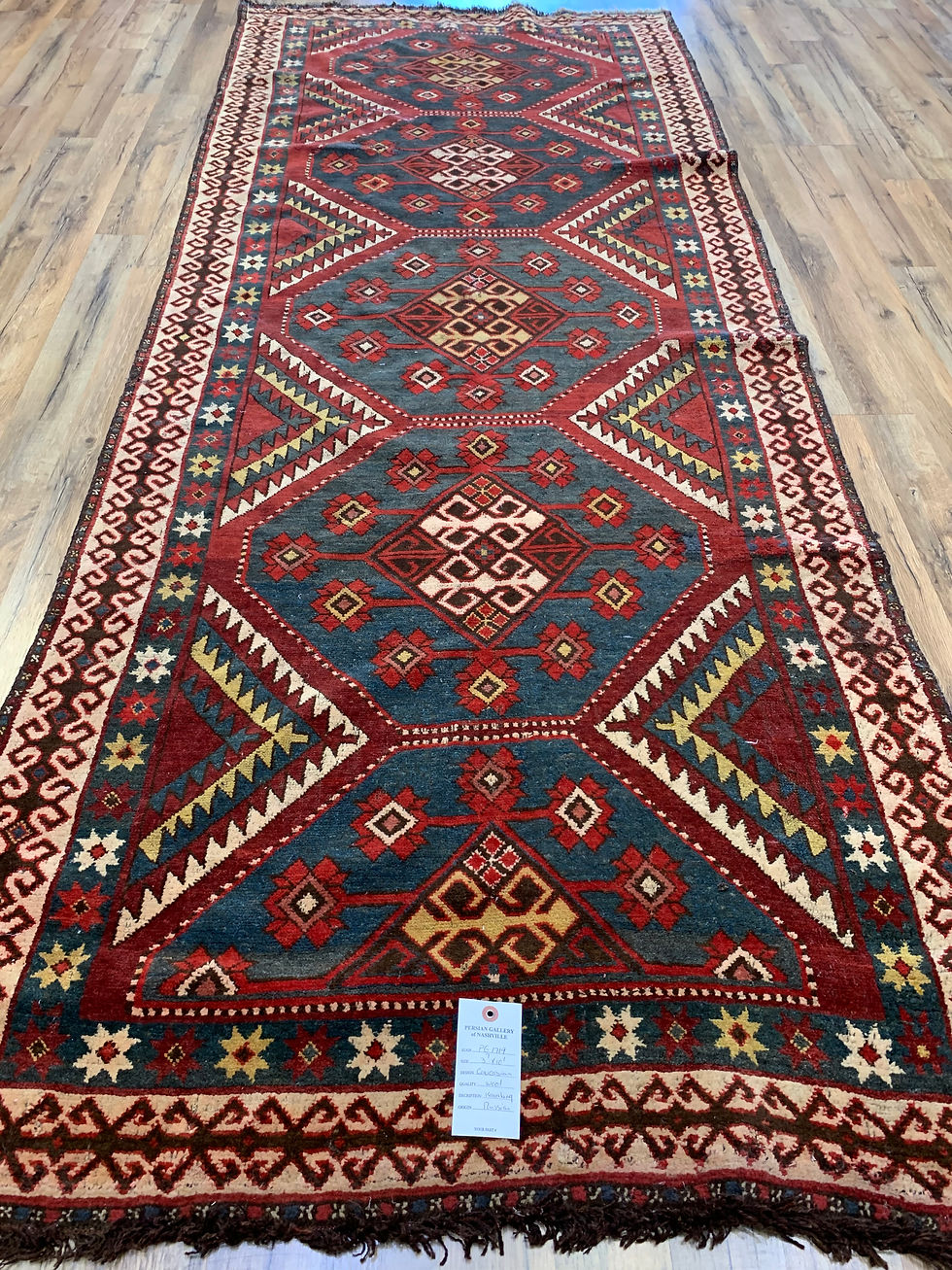 Russian Karabakh runner, measuring 3'7" x 10'1". This hand-woven masterpiece is crafted from premium wool,