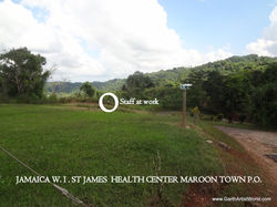 Maroon Town Project #1 Staff out side.JPG