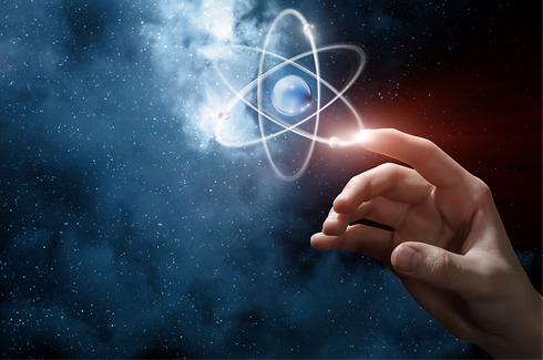 Hand clicks on an atom on the background of outer space_edited.png